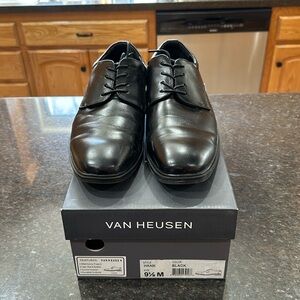 Men’s dress shoes.  Worn once